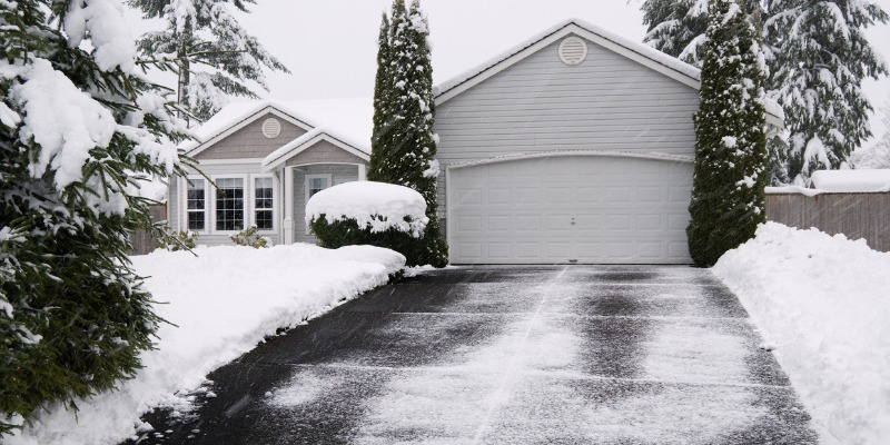 house with large garage in winter